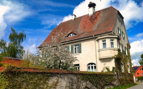 Markgrafenkirche Pfarrhaus mit Storch
