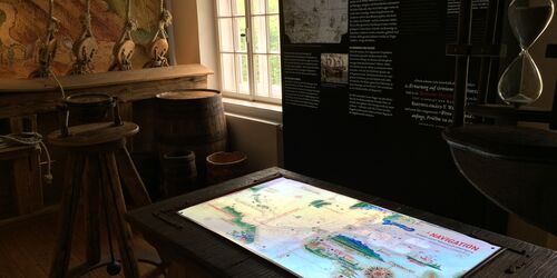 Kartentisch im Fugger und Weiser Erlebnismuseum